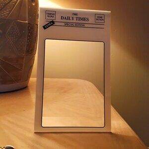 Retro Daily Times picture frame, plastic